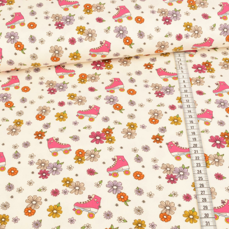 Jersey - Patins à roulettes roses avec fleurs sur crème